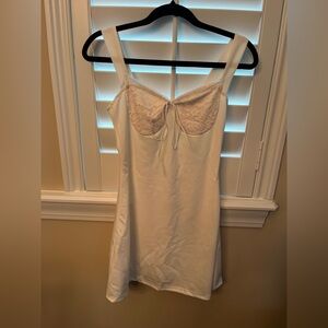 Lace-Trim Ivory Slip Dress with Bow Tie Detail